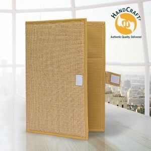 FF 001 partly open beige folder with mustard-coloured edging and paired pale hook-and-loop patches on the front and rectangular side tab.