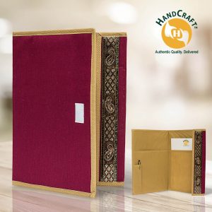 FF 018 A composite: maroon cover, tan edging and paisley-patterned side panel; inset shows two pockets, a pen holder, pen and paper.
