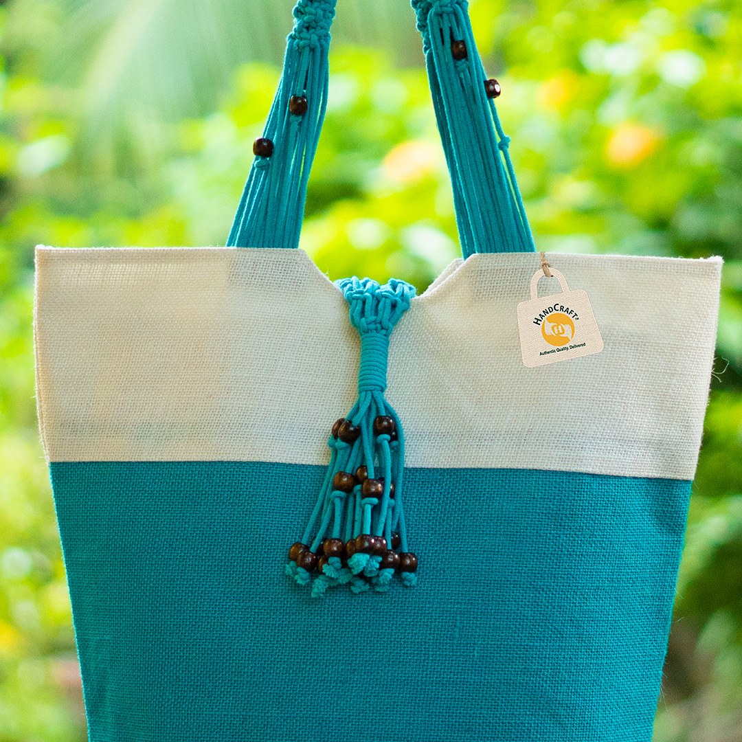 Turquoise and dark-trimmed shoulder bag.