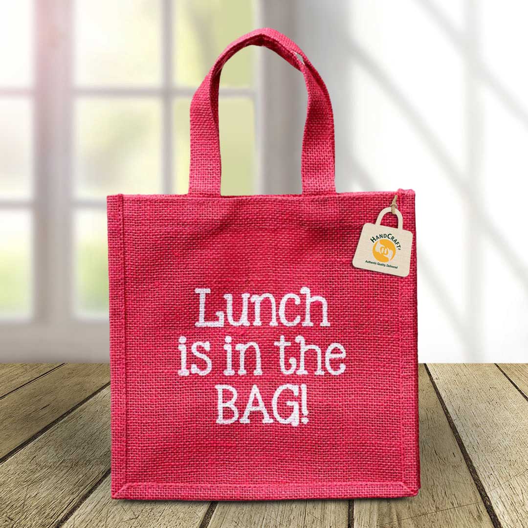 Pink bag with a Lunch is in the BAG print and short flat handles.