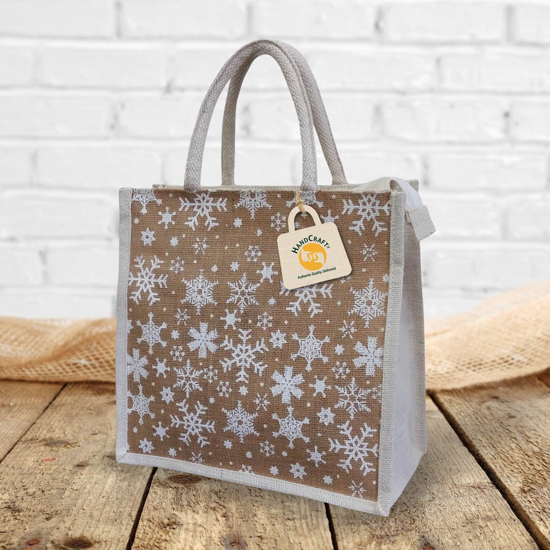 Closed bag with a white snowflake pattern and pale handles.